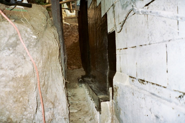 Below grade block foundation waterproofing Foundation waterproofing drainage panel