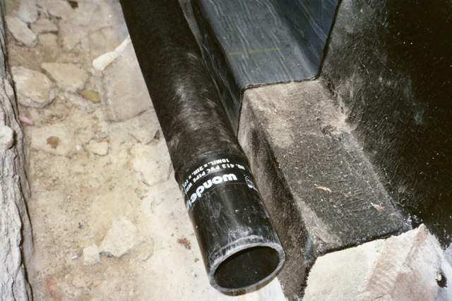 French drain positioned at footing base