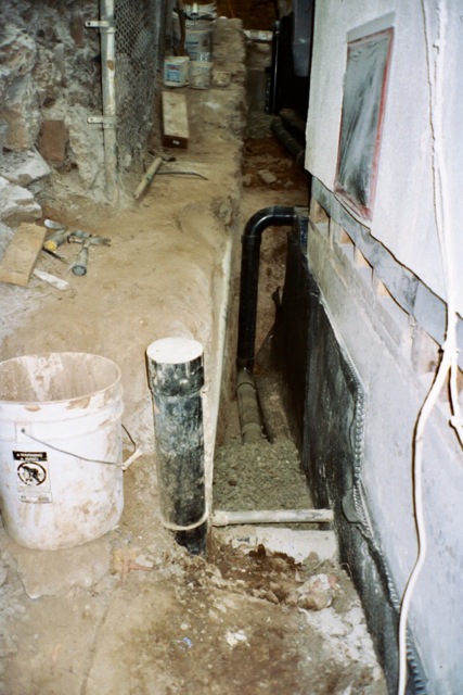 Step foundation drainage change in elevation