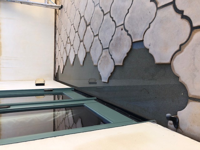 Flood test to deck waterproofing area before tile installation