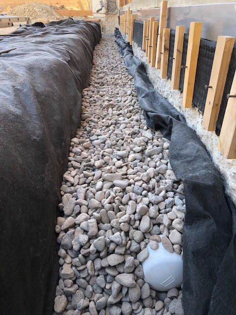 Gravel applied over french drain