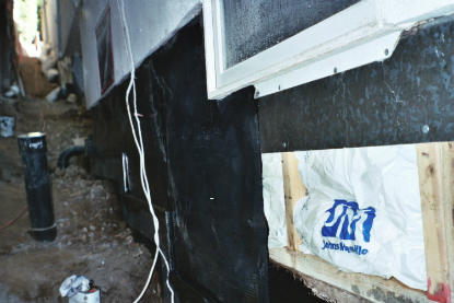 Sheet applied membrane creating a monolithic membrane over structural framing and block foundation Sheet applied membrane creating a monolithic membrane over structural framing and block foundation