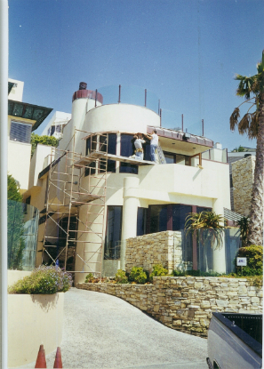 Copper awning installation above balcony